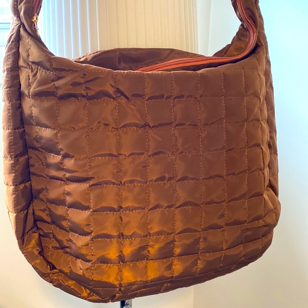 NWOT. quilted copper brown shoulder bag 17”wide 14” length not including strap